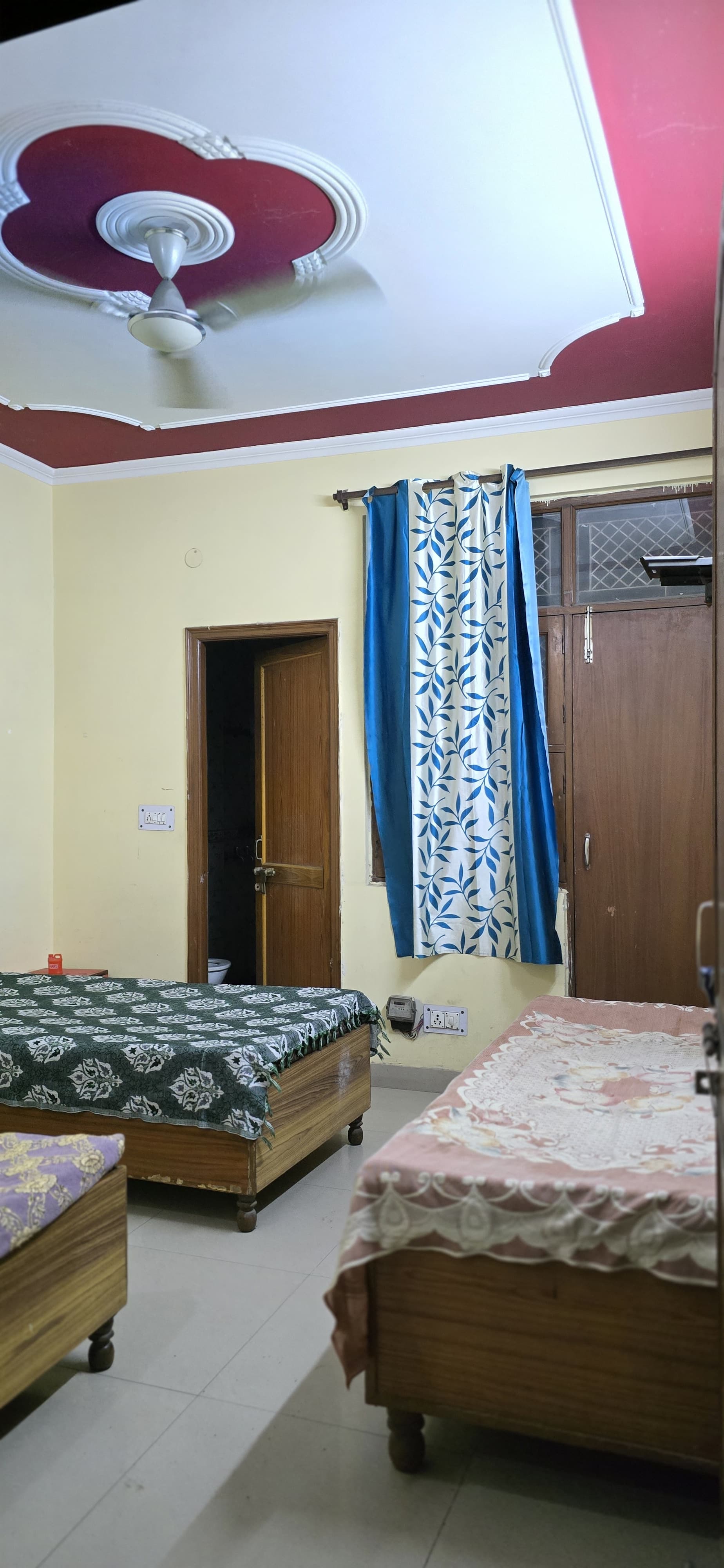 Cozy furnished room with pink decor